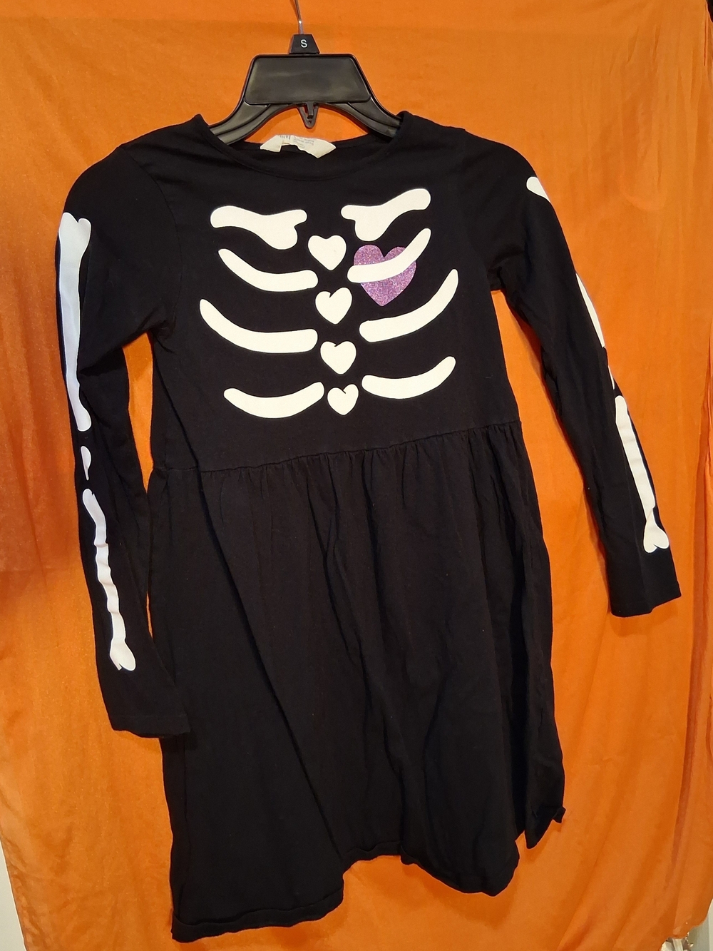 H&M Black Skeleton Dress with Purple Heart Accent
